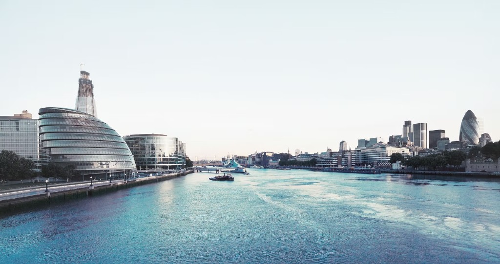 Panoramic view of London financial district and river, representing global institutional reach and strategic gaming investments.